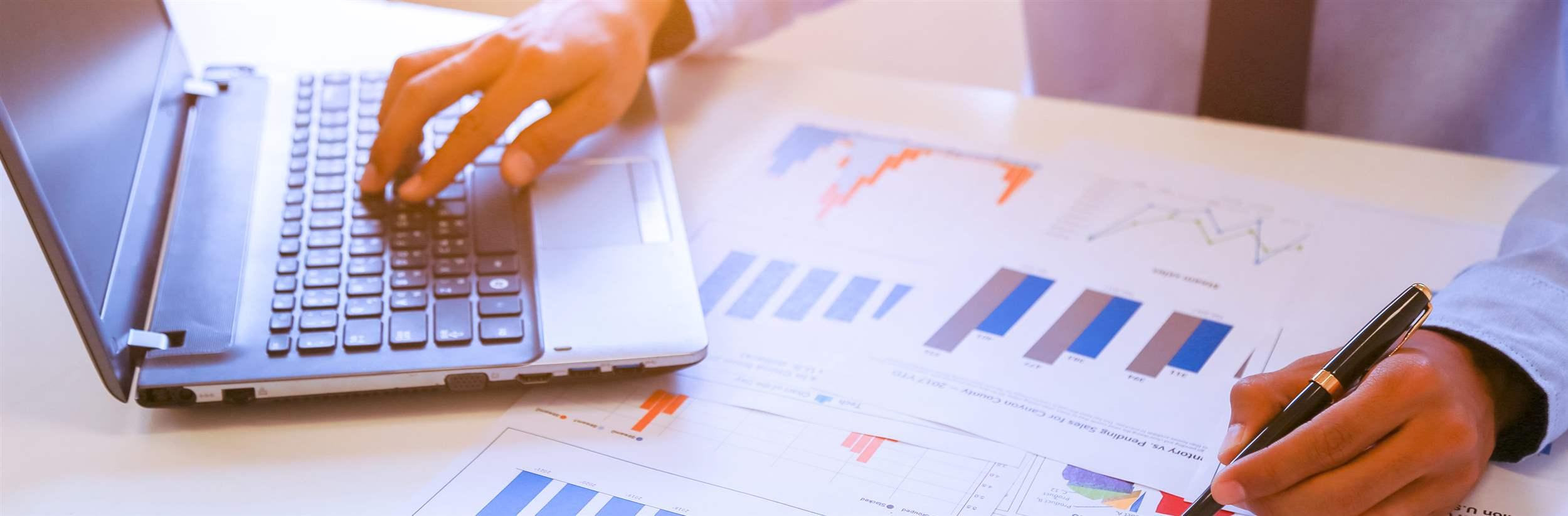 Business People Discuss Graph Document