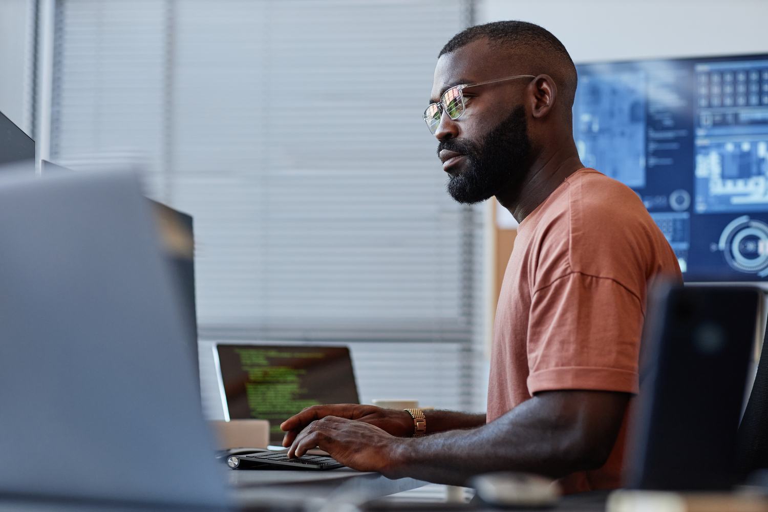 An enterprise architect working across multiple screens